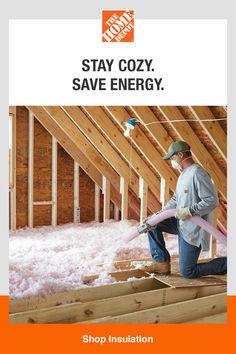 a man is working on the roof of his attic in order to save energy from heat