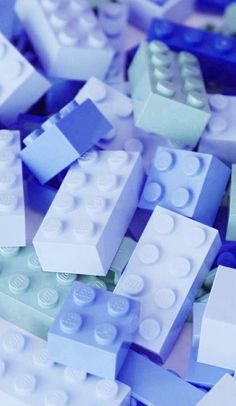 many different colored legos laying on top of each other