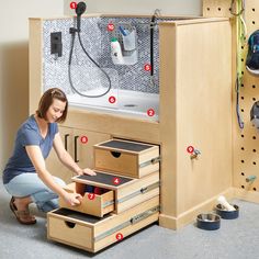 a woman is opening drawers in a bathroom