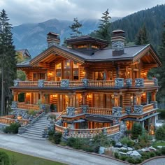 a large wooden house with lots of windows and balconies on the top floor