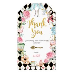 a black and white checkered thank card with pink roses on the front, gold foil lettering