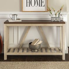 a wooden table with a sign above it