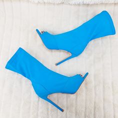 New Square Open Toe 4.5" Heels Full Side Zipper For Easy On/Off Stretch Us Ladies Sizes Measurements For Size 7 Are As Follows And Are Approximant.( These Will Go Up As Sizes Go Up) Total Height Including Heel Is 12" Top Opening 12" And Can Stretch To 16" Blue High Ankle Heels For Party, Blue High Heel Summer Boots, Blue Ankle-high Summer Boots, Trendy Blue Summer Boots, Blue Pointed Toe Heels For Winter, Blue Heels For Winter Party, Blue Party Heels For Winter, Winter Party Blue Heels, Light Blue High Heel Party Boots