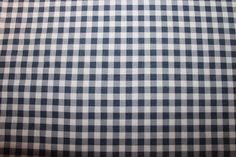 a black and white checkered fabric is shown