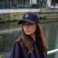 A stylish geometric embroidered black baseball cap, made from a wonderful melton wool blended fabric with a fuzzy texture.Embroidered with an elegant Celtic Knot Pattern that goes round in an infinite loop, an abstract mathematical knot.Fit & Finish-   Adjustable size strap with buckle-   6-panel construction-   Firm Peak-   Deep fit - sits fairly deep on the crown of the headBlck 6-panel Cap, Black Wool Cap, Embroidered Black Cap, Textured Black Hat, bucket hat, cool Dad Hat, Visor Cap, Pea Winter Urban Baseball Cap With Curved Brim, Urban Winter Baseball Cap With Curved Brim, Winter Snapback Hat With Curved Bill, Black Baseball Cap With Embroidered Logo For Winter, Winter Urban Curved Brim Baseball Cap, Winter Baseball Cap With Embroidered Logo And Curved Brim, Winter Baseball Cap With Embroidered Logo, Winter Black Baseball Cap With Curved Brim, Winter Snapback Baseball Cap With Embroidered Logo