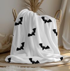 For My Halloween Lovers and Fall Grlz! Cozy Simple Bat Blanket: #BatPatternBlanket #BatHalloweenBlanket #SimpleBatBlanket #HalloweenBlanket #FallBatBlanket #CozyFallBlanket #SeasonalBlanket  Create a cozy and warm atmosphere at home with this plush velveteen blanket. Available in two sizes: 47x57", 57x77". .: 100% polyester (SPOKE) or 83% Polyester and 17% Spandex (Miami Sublimation) .: Your print goes on one side of the blanket in high detail and vibrant color .: Medium heavy-weight fabric (8.85 oz/yd² (300 g/m that feels extra soft to the touch (thickness of the fabric may slightly vary) Bat Blanket, Spooky Halloween Food, Fall Bedroom Decor, Boo Basket, Bat Pattern, Halloween Blanket, Fall Bedroom, Halloween Lovers, Fall Gifts