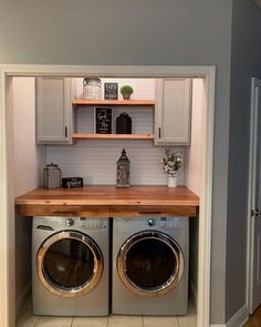 a washer and dryer in a small room