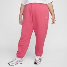 Grounded in style, comfort and versatility, meet our take on luxury loungewear. Whether you're running errands or rewatching your favorite show, these midweight fleece sweats feel extra soft on the inside to help keep you cozy. The oversized fit is intended to sit high on your hips for comfort and a stay-put feel. Pink Relaxed Fit Sweatpants For Sportswear, Pink Fleece Sweatpants For Loungewear, Cozy Pink Relaxed Fit Sweatpants, Nike Sportswear Phoenix Fleece Women's High-waisted Wide-leg Sweatpants, Sporty Pink Fleece Joggers, Nike Sportswear Phoenix Fleece, Sweatpants Nike, Oversized Sweatpants, Luxury Loungewear