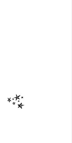 four airplanes are flying in the sky and one is black and white with stars on it