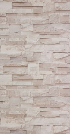 an image of a wall made out of white marble bricks or stone veneers