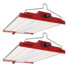 two red and white lights hanging from hooks