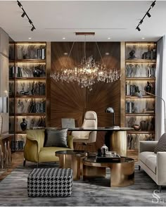 a living room filled with furniture and a chandelier