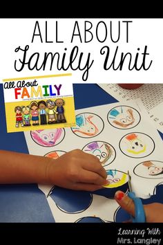 a child is cutting out an image with scissors and glue on it to make a family unit