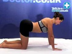 a woman is doing push ups on her stomach