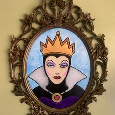 a painting of a woman with a crown on it's head in a gold frame