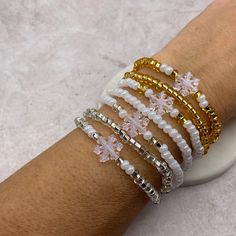 These delicate Winter-Christmas clear snowflake beaded stretch bracelets are handcrafted personally by me, Derlis. You can pick your size. Also, you can pick your favorite(s) one(s) separately and creat your own set/stack. A wonderful Christmas gift for your children, wife, friends, family or love ones, just in time for the Holidays. It is very important that you measure your wrist before placing your order to find your correct size bracelet. You can use a flexible tape measure, or a piece of pa Winter Beaded Bracelets, Winter Bracelet Ideas, Winter Bracelet, Snowflake Shape, White Bracelet, Christmas Bead, White Bracelets, Silver Line, Stackable Bracelets