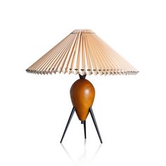 a table lamp with a wooden shade on it