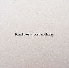 the words kind words cost nothing written in black on a white background with an image of a cat