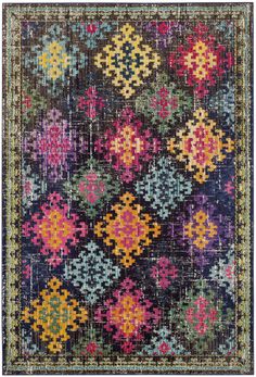 an old rug with colorful flowers on the front and back end, in various colors