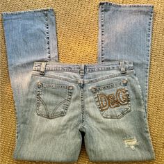 Fabulous Vintage D&G Low Rise Boot Cut Jeans. Rise - 7.5” Waist - 29” Inseam - 29” Leg Opening - 8.5” Vintage Low Waist Jeans, D&g Jeans, Vintage Low Rise Jeans, Thrifting Manifestation, Blue Denim Outfits, Boot Cut Jeans Women, Vintage Dolce And Gabbana, Pasha Style, Thrift Board