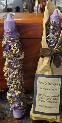 Our purple intention tapers are truly magical as well as beautiful! Choose from  Dark Purple- Clairvoyance, Opening The Third Eye Light Purple- Peace & Tranquility  Each taper is 8",  hand dressed with organic home grown herbs that are perfectly blended for your intentions then adorned with a ribbon and pentagram charm.   * ALWAYS stay with burning candle! * Candle will burn high & strong due to herbs ! * Burning herbs will drop off!  Remove all ribbons,  labels and charms before burning in a fi Intention Candles Diy, Wicca Altar Ideas, Deity Candles, Aries Witch, Dressed Candles, Witchy Decorations, Enchanted Items, Diy Witches, Burning Herbs