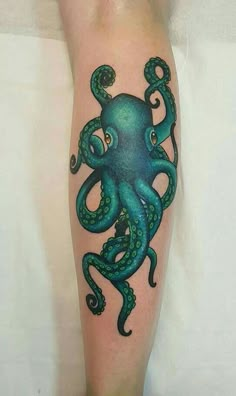 an octopus tattoo on the leg