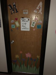 a door decorated with magnets and pictures