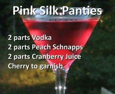 a pink drink in a wine glass with the words pink silk panties written below it