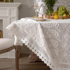 the table is covered with white lace