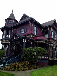 an old victorian style house with many windows