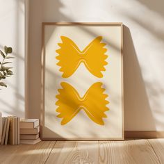 an image of two yellow flowers on white paper in front of a book shelf with books