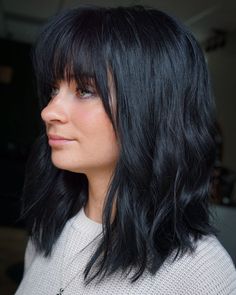 Rich Black Lob with Feathered Bangs Medium Long Bob With Bangs, Black Shoulder Length Hair With Bangs, Shoulder Length Rocker Hair, Brunette Bangs Shoulder Length, Shaggy Lob With Bangs Shoulder Length, Bangs Plus Size, Mid Length Haircut With Bangs, Bangs Haircut Ideas, Cute Shoulder Length Haircuts