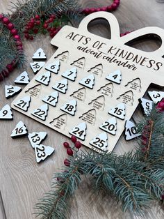 a wooden christmas ornament with numbers on it