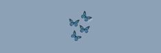 several blue butterflies flying in the sky