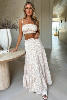 Summer vibing in the Selina Set! This gorg maxi skirt features an elasticated waistband with frilled edges, a flowy fitting skirt and double lined material. Style her with the matching crop and a pair of White Sandals. FABRICATION: 100% polyester SIZING: Emily's height is 170cm/5'5 and wears a size AU 6 / US 2. 2 Piece Outfit Set Skirts Summer, Flowy Skirt Outfit, Crop Outerwear, Orange Swimwear, Green Swimwear