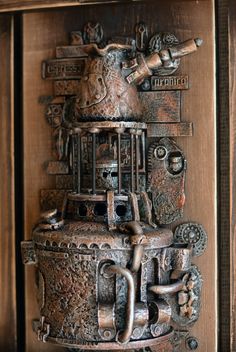 an old fashioned stove on display in a wooden cabinet