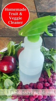 homemade fruit and veggie cleaner on a plate surrounded by fresh fruits and vegetables