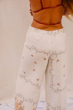 Up-cycled Floral Wide Leg Pants by Vagabond Ibiza These beautiful upcycled vintage pants are crafted from a blend of linen and cotton linen with a soft, romantic floral print. The wide-leg cut provides an easy, flowy fit, while the elastic drawstring waist adds comfort and adjustability. Perfect for a relaxed yet stylish bohemian look. • Size: Model is a size UK 8-10, but the adjustable waist and loose fit allow these pants to comfortably fit up to a UK 10-12. • Design: Floral print with a wide-leg style, soft and lightweight fabric. • Fabric: Vintage cotton linen blend, breathable and perfect for any season. • Handmade in Ibiza: Upcycled and reworked at the Vagabond Ibiza studio, each piece is one of a kind. These vintage-inspired boho pants are a perfect wardrobe staple for those who app Floral Wide Leg Pants, Indian Sari Dress, Romantic Floral Print, Sari Dress, Kimono Sweater, Retro Girls, Boho Pants, Indian Sari, Bohemian Look