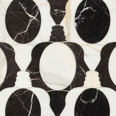 black and white marble with oval designs on it