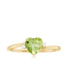 Product Details This elegant promise ring features a heart shape Peridot gemstone at its center, complemented by sparkling Diamond on either side. The peridot stone boasts a lovely light green hue and is expertly cut to showcase its beauty. The heart shape of the stone symbolizes love and commitment, making it a perfect choice for a promise ring. The Diamond adds an extra touch of elegance and sparkle to the design. This ring is a timeless piece of jewelry that will be cherished for years to come. Product Information SKU SHP-RINGS082219748 Width 6.5 mm Height 4 mm Weight 1.84 gm (Approximate) PERIDOT INFORMATION No.of Stones 1 Pieces Total Weight 0.90 Carat (Approximate) Dimension(approx) Heart-6X6 mm-1 Pcs Color Green Cut Brilliant Shape Heart Setting Type Prong-Setting Quality Grade AAA A Promise Ring, Peridot Rings, Pista Green, Peridot Stone, Ring With Diamond, Sparkling Diamond, Peridot Ring, Peridot Gemstone, 18k Yellow Gold Ring