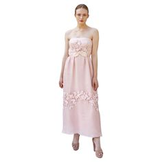 Elevate any special occasion with the Helena Barbieri 1964 Pale Pink Gown. Its fun and dainty pastel pink color adds a touch of whimsy, making it a perfect alternative to traditional wedding gowns. Whether as a bridesmaid or maid of honor, stand out in this beautifully adorned strapless gown. Hand Sewn embroidery Condition: Material: Sleeve Style: n/a Neckline: Strapless Closure: Zipper, Hook & Eye closure Details: strapless detail, front bow, floral ornamentation, pastel pink color Length: Maxi Couleur Rose Pastel, Bridal Gowns Vintage, Wool Knitted Dress, Pink Gown, Antonio Berardi, Gianfranco Ferre, Pink Gowns, Rose Pastel, Strapless Gown