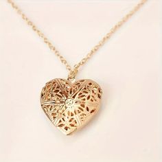 This Elegant Necklace Features A Heart-Shaped Hollow Metal Photo Locket Design, Plated With 14k Gold. The Locket Is Perfect For Carrying A Special Photo Of Your Loved One, Making It A Great Gift For Family And Friends. The Necklace Is Stylish And Versatile, Suitable For Any Occasion, And The Heart-Shaped Design Adds A Touch Of Love To Your Outfit. The Gold Plating Gives The Necklace A Luxurious Look, Making It A Great Addition To Your Jewelry Collection. Heart Locket Necklace, Locket Pendant Necklace, Jewelry Lockets, Heart Shaped Necklace, Heart Pendant Gold, Silver Heart Pendant, Do You, Photo Locket, Necklace Box