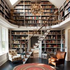 a room filled with lots of books and furniture