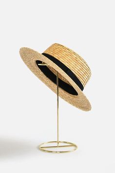 Bring classically chic flair to your summer look with the Abella Classic French Boater Hat. This classic French accessory is made from breathable straw and designed with an adjustable pull string for the perfect fit. You'll love the elegant aesthetic this piece adds to any ensemble.Head circumference: 55.5cm (designed with adjustable pull string for the perfect fit)Your purchase can also be made at:www.enbelleepoque.com Woven Straw Hat With Short Brim For Day Out, Chic Lightweight Natural Straw Hat, Chic Spring Boater Hat Made Of Paper Straw, Chic Woven Fedora Straw Hat, Chic Brimmed Boater Hat In Toquilla Straw, Chic Woven Straw Hat For Day Out, Chic Brimmed Straw Fedora, Adjustable Woven Fedora For Spring, Chic Woven Panama Hat