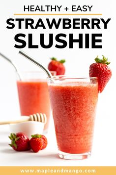 two glasses filled with strawberry slushie next to strawberries