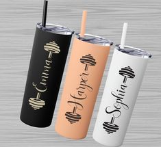 three different types of tumblers with the same logo on them, each one has a straw in it