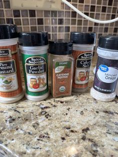 spices are lined up on the counter top