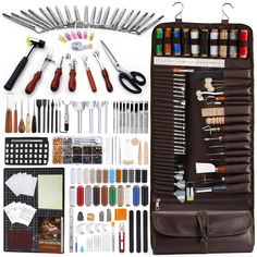 an assortment of crafting supplies and tools in a brown case