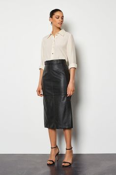 All-day confidence just from a skirt? Tick. Designed with premium leather that’ll highlight your figure to perfection, it features a high waist with decorative buckle, exposed stitched panels and split hem at the back. Long Leather Skirt, Black Leather Pencil Skirt, Skirt Collection, Leather Skirt Outfit, Pencil Skirt Outfits, Leather Midi Skirt, Black Leather Skirts, Leather Pencil Skirt, Pencil Skirt Black