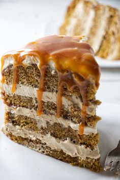 a slice of cake with caramel drizzle on top